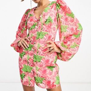 Green and pink dress. Long sleeves.